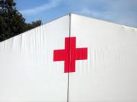 red cross tent to help